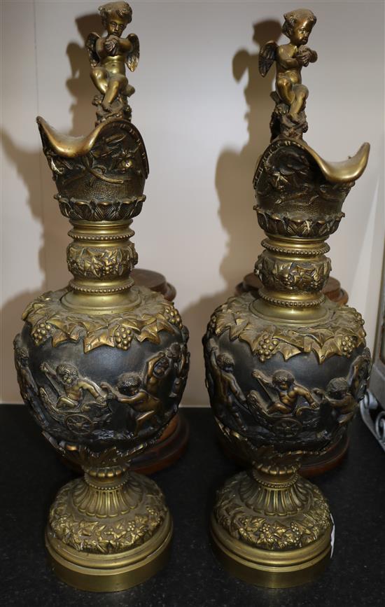 A pair Victorian ormolu ewers, Overall H.32in.